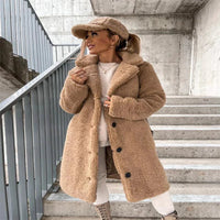 Women's MANDOTOS lamb wool coat with a tailored fit, featuring a soft, warm wool texture and classic design.