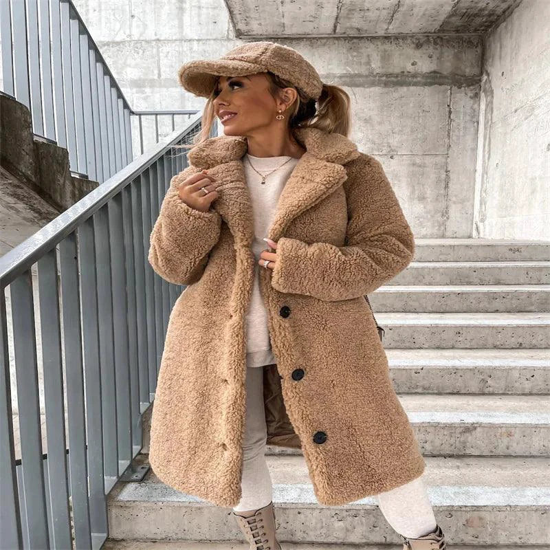 Women's wool coat by MANDOTOS featuring a classic lamb wool design, tailored fit, and cozy texture in neutral color.