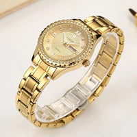 Mandotos WWOOR Elegance gold diamond quartz watch with a sleek design and sparkling dial, showcasing luxury and style.
