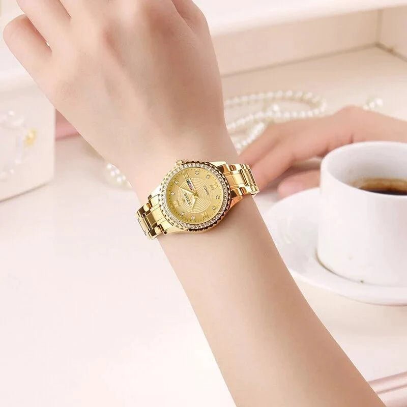 Mandotos WWOOR Elegance gold diamond quartz watch with a sleek design and sparkling accents on the dial.