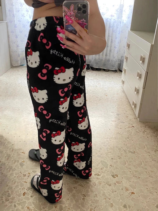 Mandotos Y2K Hello Kitty pajama pants featuring Sanrio anime cartoon print, comfortable women's sleepwear trousers for home lounging.