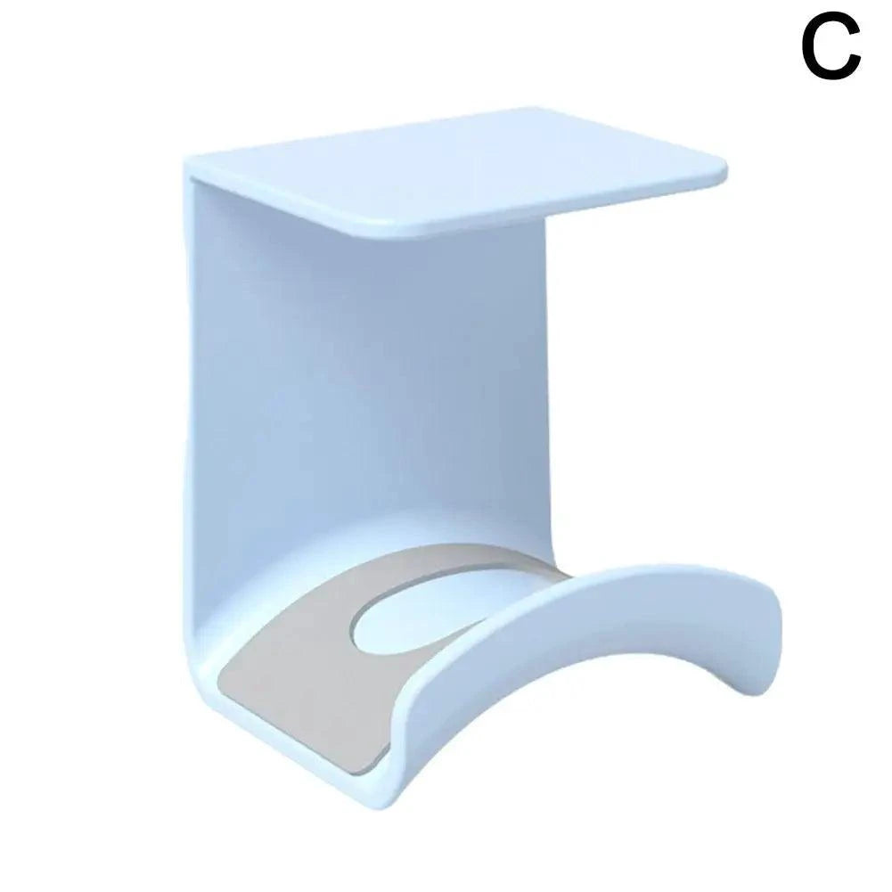 Plastic wall-mounted headphone stand and headset hanger for gaming earphones, ideal for under-desk organization and support.