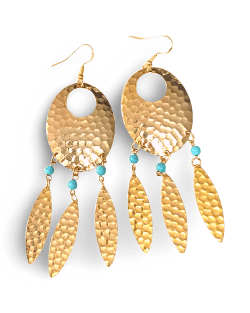 Navette dream catcher earrings by The Urban Charm featuring turquoise accents and feather details, hanging from silver hooks.